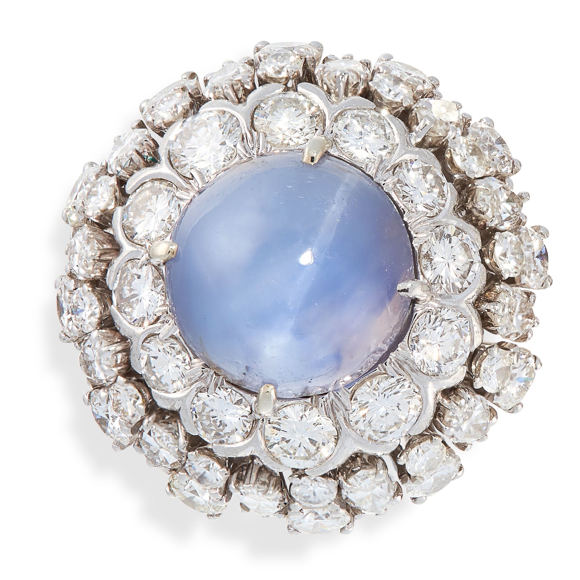 A VINTAGE STAR SAPPHIRE AND DIAMOND RING, DAVID WEBB in platinum, set with a circular cabochon