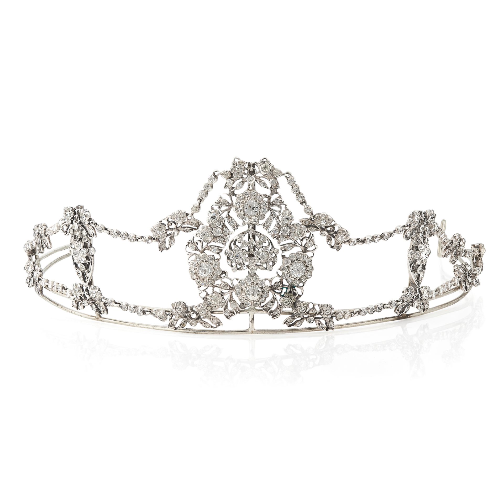 AN ANTIQUE PASTE DIAMOND TIARA the frame applied with five principal sections of foliate and