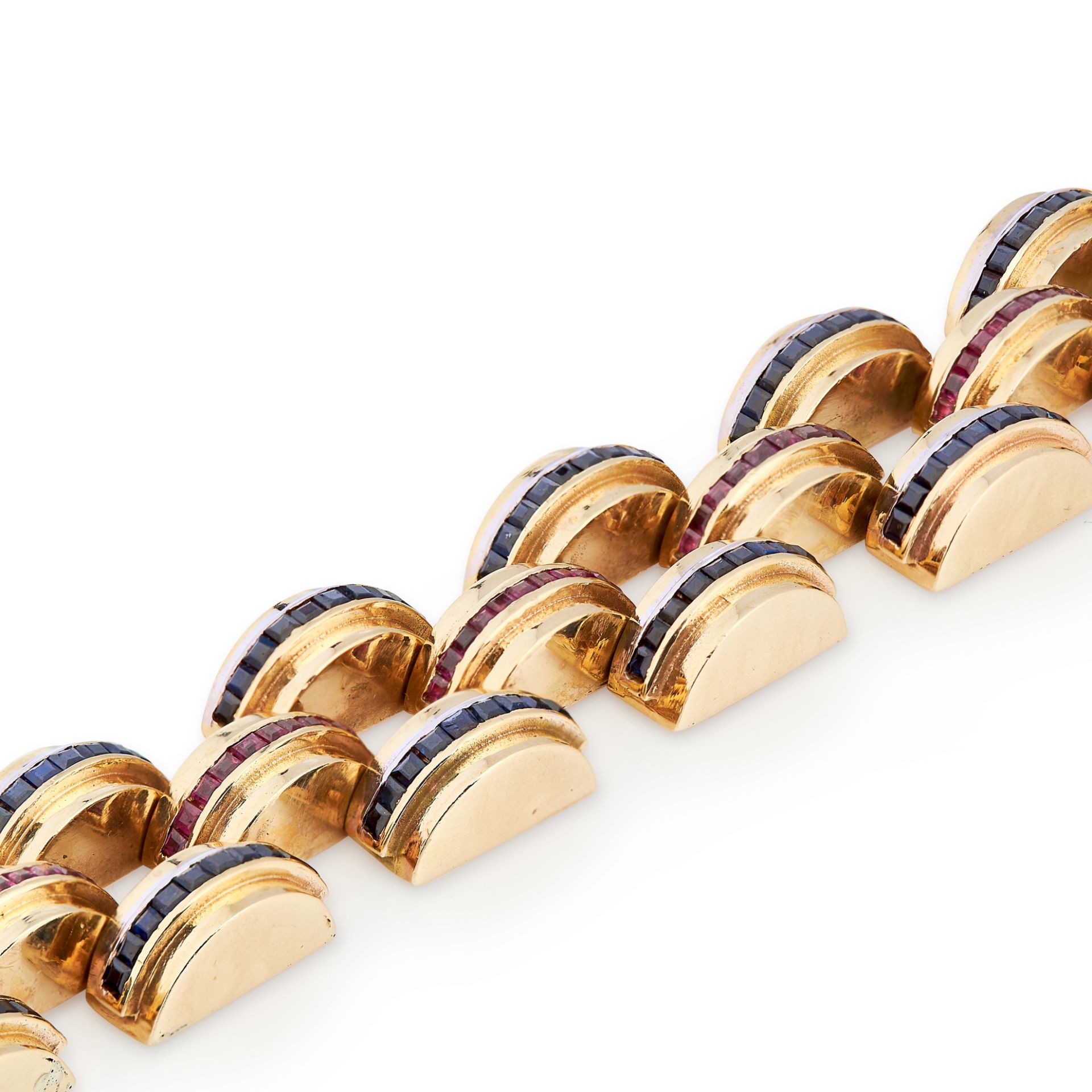 A VINTAGE SAPPHIRE AND RUBY TANK BRACELET in 18ct yellow gold, formed of three rows of staggered - Image 2 of 2