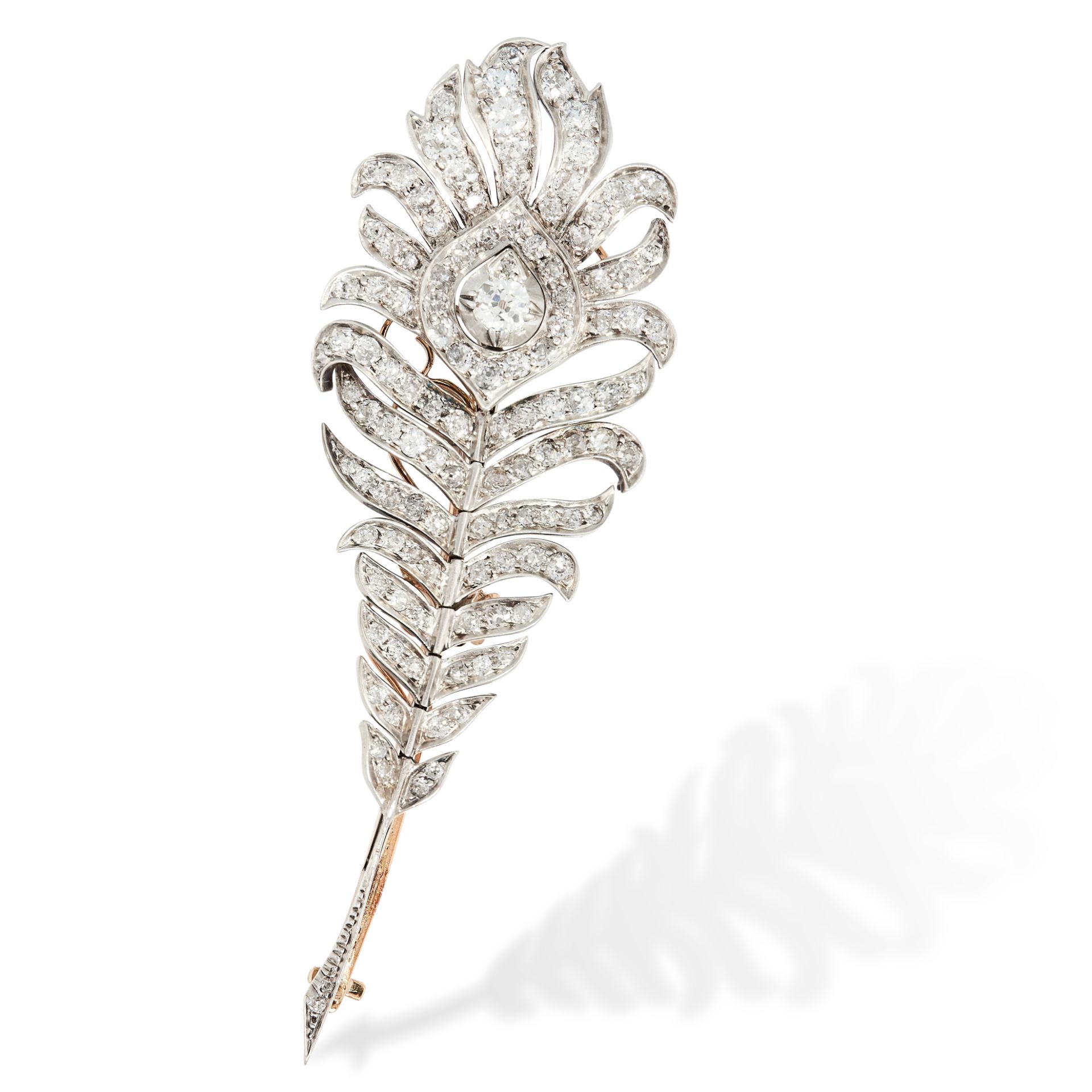 A DIAMOND PEACOCK FEATHER BROOCH in yellow gold (with rhodium plating), designed as the tail feather