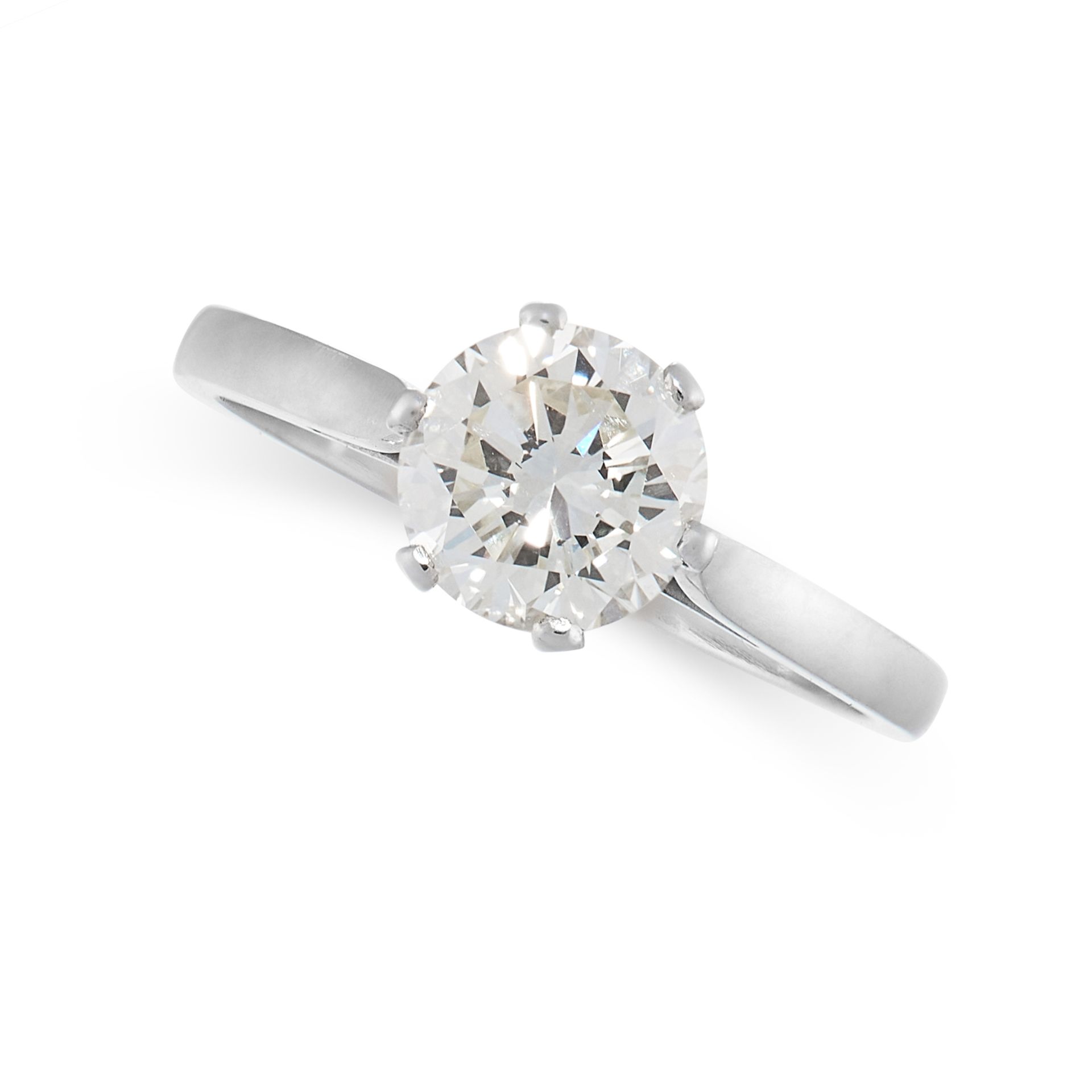 A SOLITAIRE DIAMOND ENGAGEMENT RING set with a round cut diamond of 1.24 carats, no assay marks,