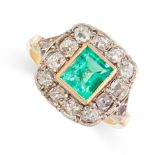 AN ANTIQUE EMERALD AND DIAMOND RING in yellow gold and silver, set with a step cut emerald of 0.97