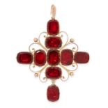 AN ANTIQUE GARNET CROSS PENDANT in yellow gold, set with foiled back faceted garnets within a