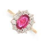 A RUBY AND DIAMOND RING in yellow gold, set with an oval cut ruby of 1.31 carats in a cluster of