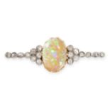 AN ANTIQUE OPAL AND DIAMOND BROOCH, CIRCA 1900 in yellow gold and silver, claw-set with a cabochon