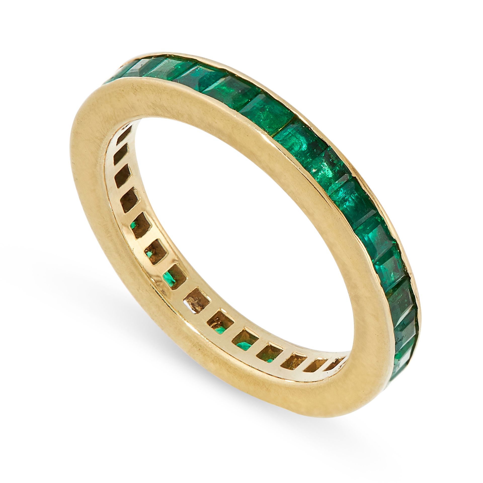 AN EMERALD ETERNITY RING in yellow gold, the band set all around with a single row of step cut - Image 2 of 2