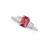 A PINK TOURMALINE AND DIAMOND RING set with an emerald cut pink tourmaline between baguette cut