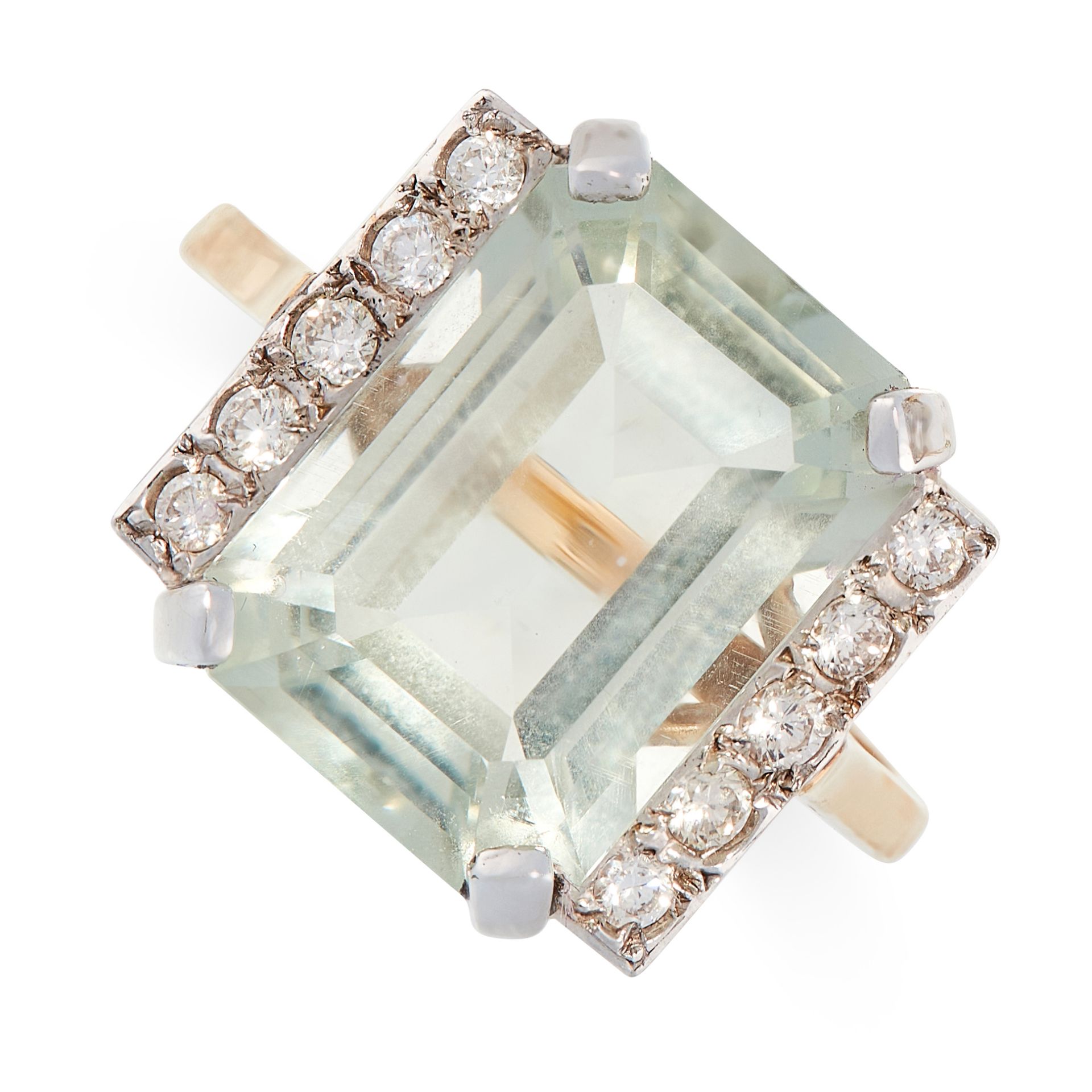 A PRASIOLITE AND DIAMOND RING in yellow gold, set with an emerald cut prasiolite accented by two