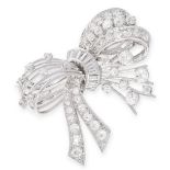 A VINTAGE FRENCH DIAMOND BROOCH in platinum and 18ct white gold, designed as a ribbon tied in a bow,