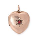 AN ANTIQUE PASTE AND DIAMOND MOURNING LOCKET PENDANT designed as a hinged heart, set with a round