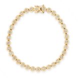 A DIAMOND LINE BRACELET in 18ct yellow gold, comprising a single row of bezel set round cut