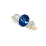 A SAPPHIRE AND DIAMOND RING in 18ct yellow gold and platinum, set with an oval cut sapphire of 2.