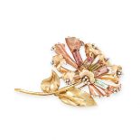 A VINTAGE TOURMALINE AND DIAMOND BROOCH in yellow gold, designed as a flower, set with five step cut