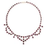 AN ANTIQUE GARNET NECKLACE in yellow gold, comprising a single row of round cut garnets,
