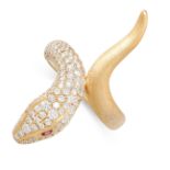 A DIAMOND AND RUBY SNAKE RING the head of the snake pave set with round cut diamonds, accented by