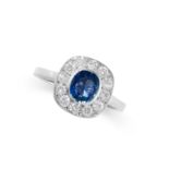 A SAPPHIRE AND DIAMOND RING set with an oval cut sapphire of 1.10 carats in a cluster of round cut