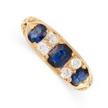 AN ANTIQUE SAPPHIRE AND DIAMOND RING, 1905 in 18ct yellow gold, set with three cushion cut sapphires