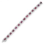 AN UNHEATED RUBY AND DIAMOND BRACELET in 14ct white gold, set with a row of fourteen oval cut and
