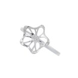 A DIAMOND DRESS RING in 18ct white gold, designed as an abstract flower, set with round cut