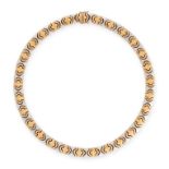A GOLD COLLAR NECKLACE in 18ct yellow gold, comprising a series of stylised links of alternating