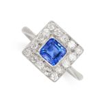 A SAPPHIRE AND DIAMOND DRESS RING set with an emerald cut blue sapphire of 1.11 carats, within a