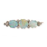 AN ANTIQUE OPAL AND DIAMOND BROOCH in yellow gold and silver, set with a trio of graduated oval