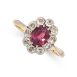 A SPINEL AND DIAMOND RING, EARLY 20TH CENTURY in yellow gold, set with an oval cut spinel of 1.01