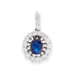 A SAPPHIRE AND DIAMOND PENDANT in 18ct white gold, set with an oval cut sapphire of 1.45 carats in a