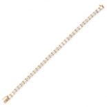 A VINTAGE DIAMOND LINE BRACELET, VAN CLEEF & ARPELS in 18ct yellow gold, set with a row of thirty-