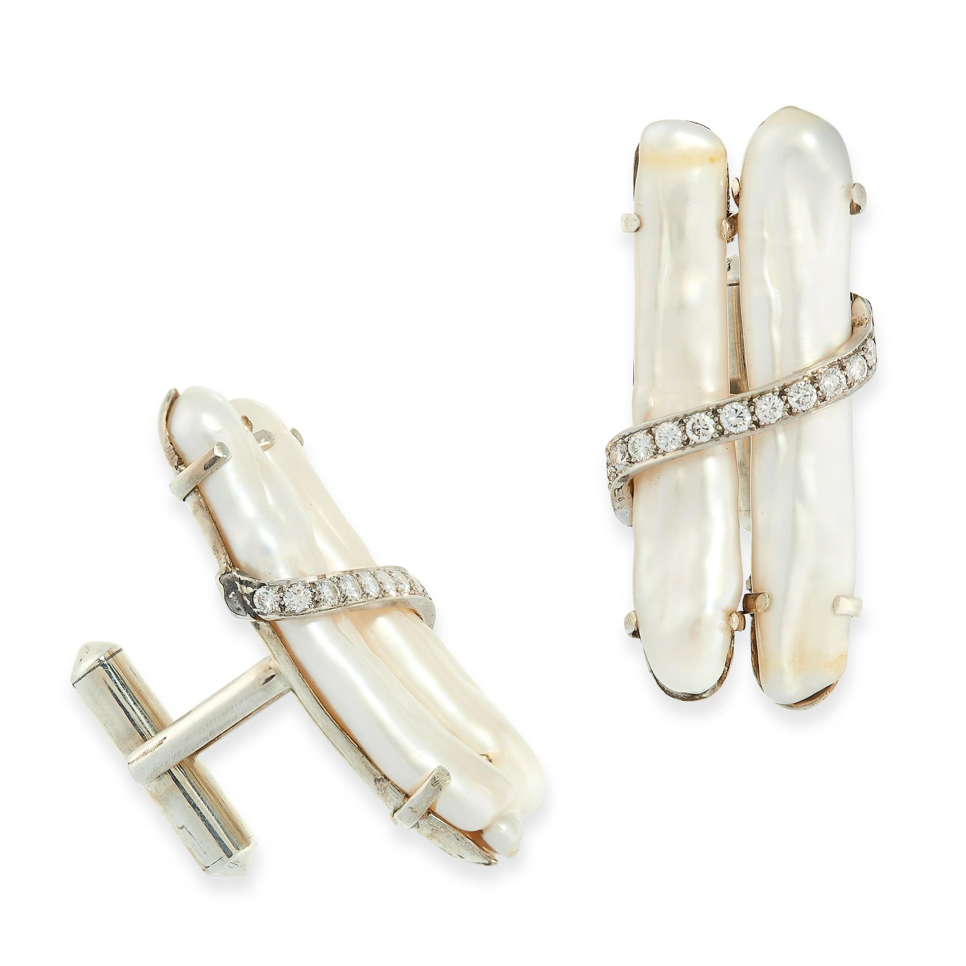 A PAIR OF PEARL AND DIAMOND CUFFLINKS each set with two elongated Mississippi river pearls, accented