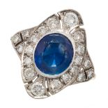 A SAPPHIRE AND DIAMOND DRESS RING in 18ct yellow gold, the navette face set with a cushion cut