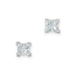 A PAIR OF DIAMOND SOLITAIRE STUD EARRINGS in 18ct white gold, each claw set with a princess cut