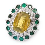 A GREEN ZIRCON, EMERALD AND DIAMOND RING in cluster design, set with a cushion cut green zircon,