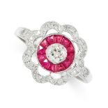 A RUBY AND DIAMOND RING in target design, the scalloped face set with an old cut diamond within a