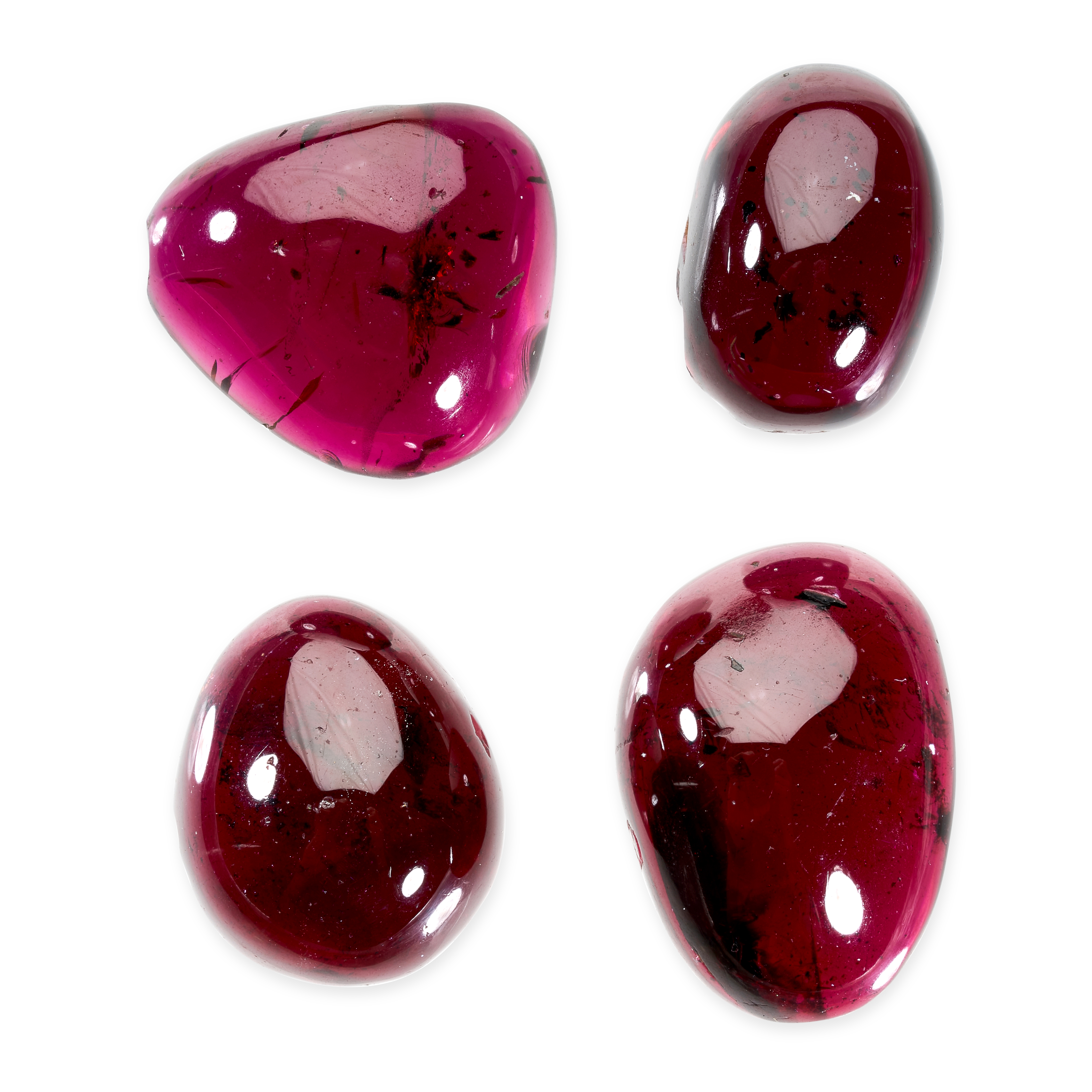 A MIXED LOT OF UNMOUNTED GARNETS cabochon, 55.67 carats.