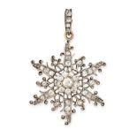 AN ANTIQUE DIAMOND SNOWFLAKE PENDANT, 19TH CENTURY in yellow gold and silver, the openwork body