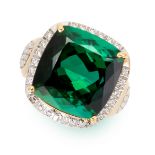 A GREEN TOURMALINE AND DIAMOND RING in yellow gold, set with a cushion cut green tourmaline of 11.32