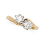 A DIAMOND TOI ET MOI RING in 18ct yellow gold, set with two round cut diamonds between stylised