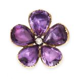 AN ANTIQUE AMETHYST AND DIAMOND BROOCH in yellow gold and silver, designed as a flower, with an