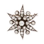 AN ANTIQUE DIAMOND FLOWER PENDANT / BROOCH, 19TH CENTURY in yellow gold and silver, set throughout