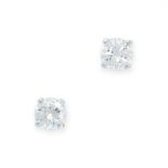 A PAIR OF DIAMOND SOLITAIRE STUD EARRINGS in 18ct white gold, each claw-set with a round cut