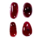 A MIXED LOT OF UNMOUNTED GARNETS cabochon, 54.09 carats.