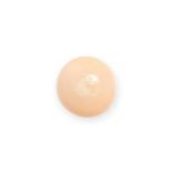 AN UNMOUNTED NATURAL SALTWATER CONCH PEARL of light orange colouration, 8.1mm x 8.3mm x 6.4mm, 3.