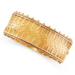 AN ANTIQUE GOLD CUFF BANGLE, 19TH CENTURY in yellow gold, in the Etruscan revival manner, the hinged