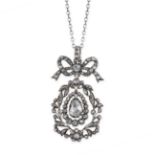 AN ANTIQUE DIAMOND PENDANT in silver, set with a central drop shaped rose cut diamond of 8.3mm,