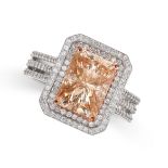 A COLOURED DIAMOND AND DIAMOND RING in 18ct white and rose gold, set with a radiant cut light