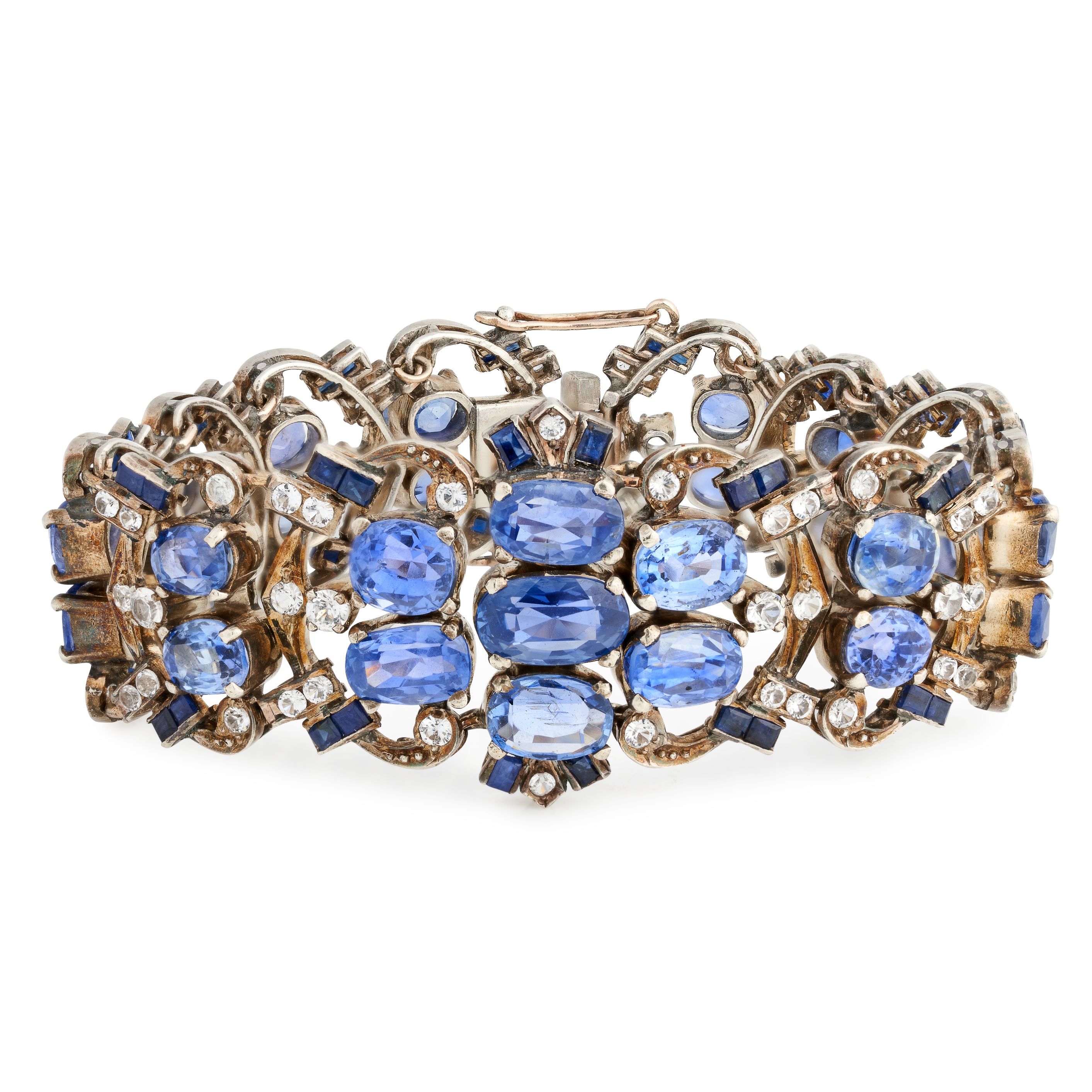 A CEYLON NO HEAT BLUE SAPPHIRE AND WHITE SAPPHIRE BRACELET the body formed of a series of openwork