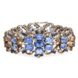 A CEYLON NO HEAT BLUE SAPPHIRE AND WHITE SAPPHIRE BRACELET the body formed of a series of openwork
