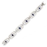 A SAPPHIRE AND DIAMOND BRACELET in platinum and 18ct white gold, comprising six bevelled links, each