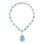 A BLUE ZIRCON AND DIAMOND PENDANT NECKLACE in 18ct white gold, the pendant set with a fancy pear cut